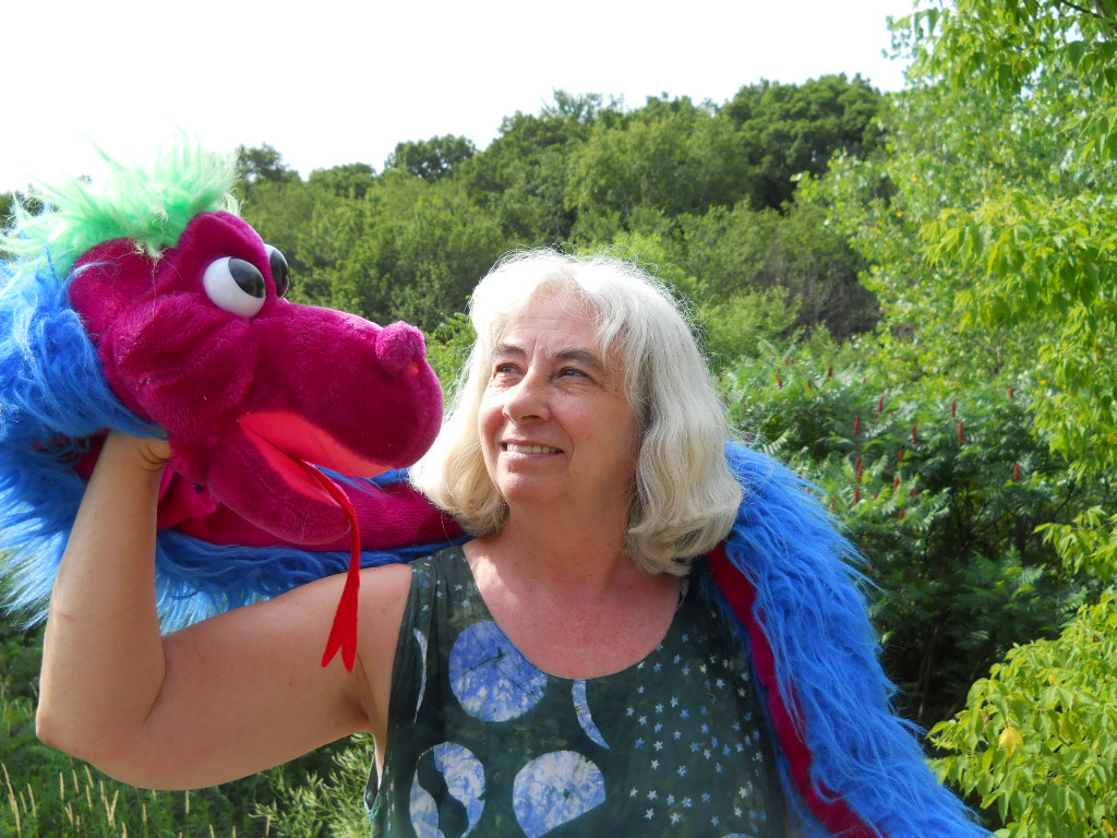 Lucy Freeman with dragon puppet