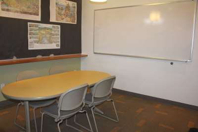 Photo of table and whiteboard in north study room