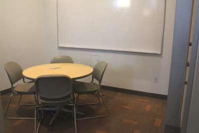 Photo of table and whiteboard in south study room
