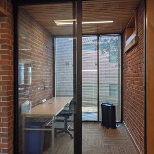 Glass and brick walled study nook