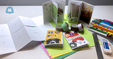 Zine making materials and completed Zine books